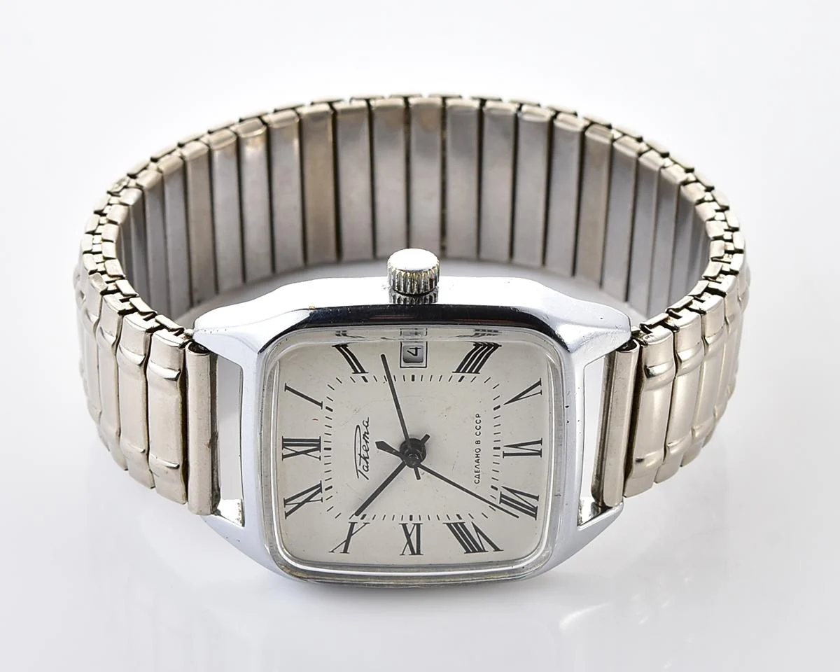 Vintage Soviet mechanical watch "Raketa" with roman numerals on the dial