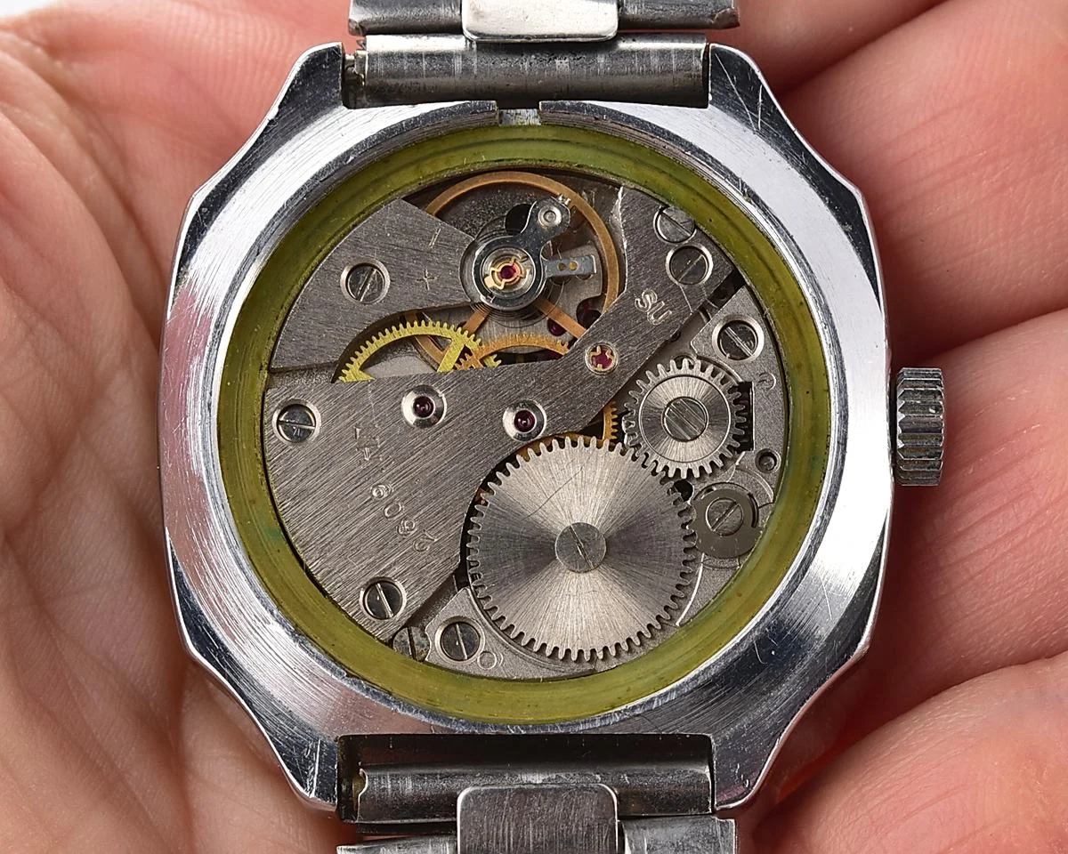 Vintage Soviet Raketa mechanical wristwatch with unusual body