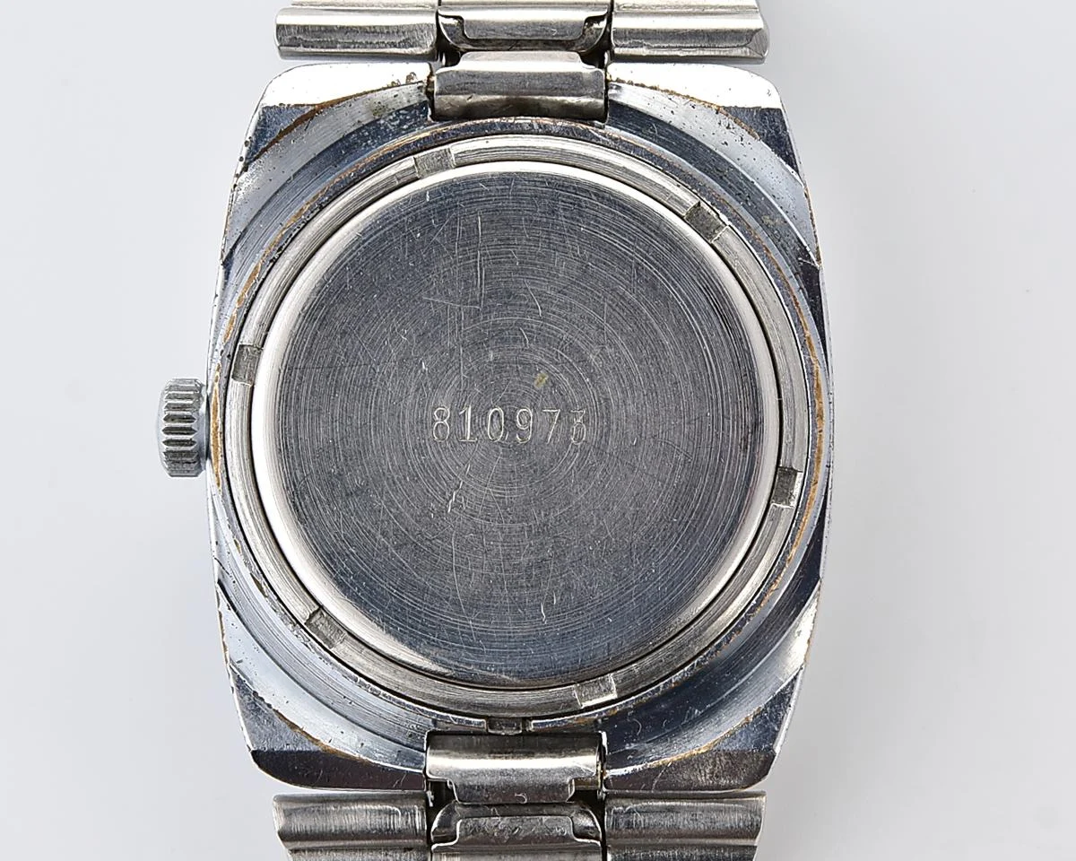 Soviet Slava quartz wristwatch with beautiful faceted crystal