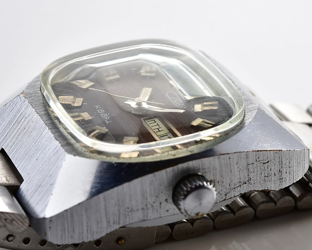 Soviet Slava quartz wristwatch with beautiful faceted crystal