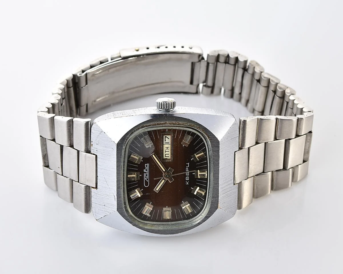 Soviet Slava quartz wristwatch with beautiful faceted crystal