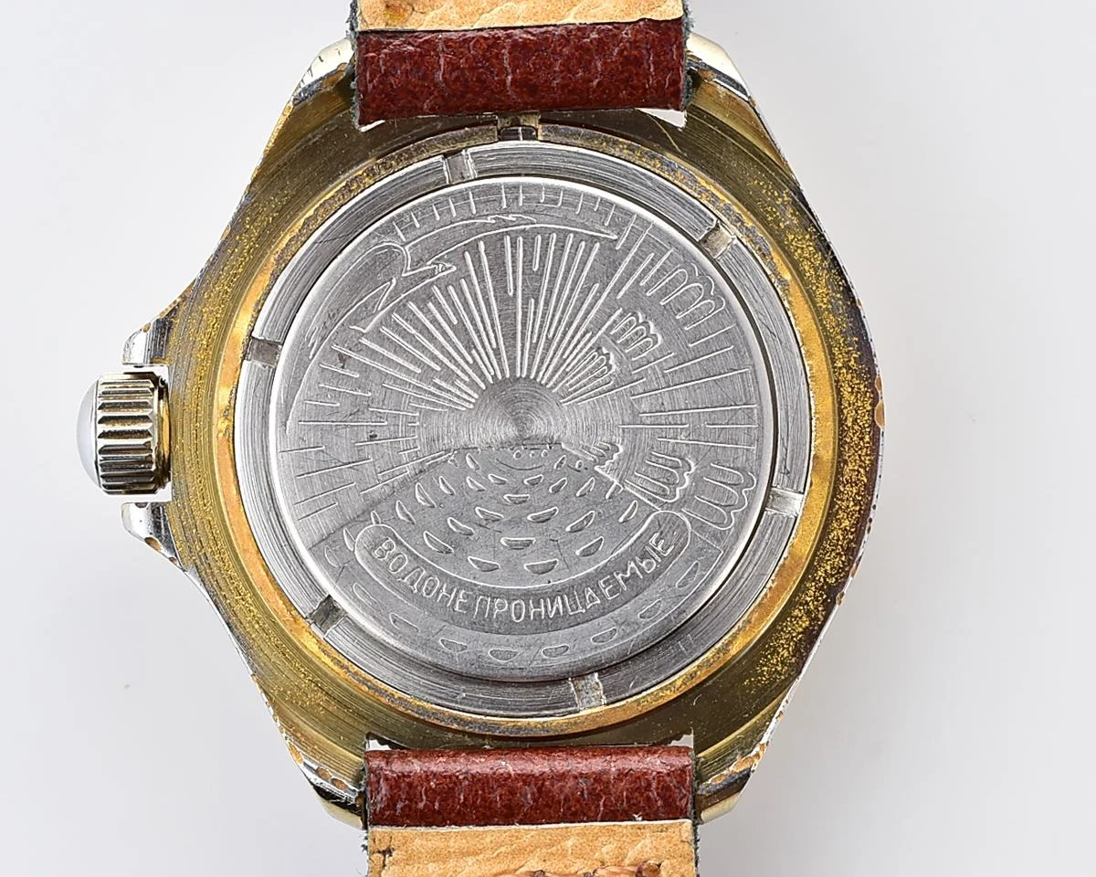 Soviet Komandirskie vintage mechanical wristwatch with Kaaba & minaret on it's gold-toned sunburst dial