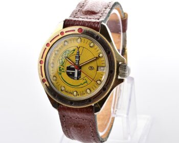 Soviet Komandirskie vintage mechanical wristwatch with Kaaba & minaret on it's gold-toned sunburst dial