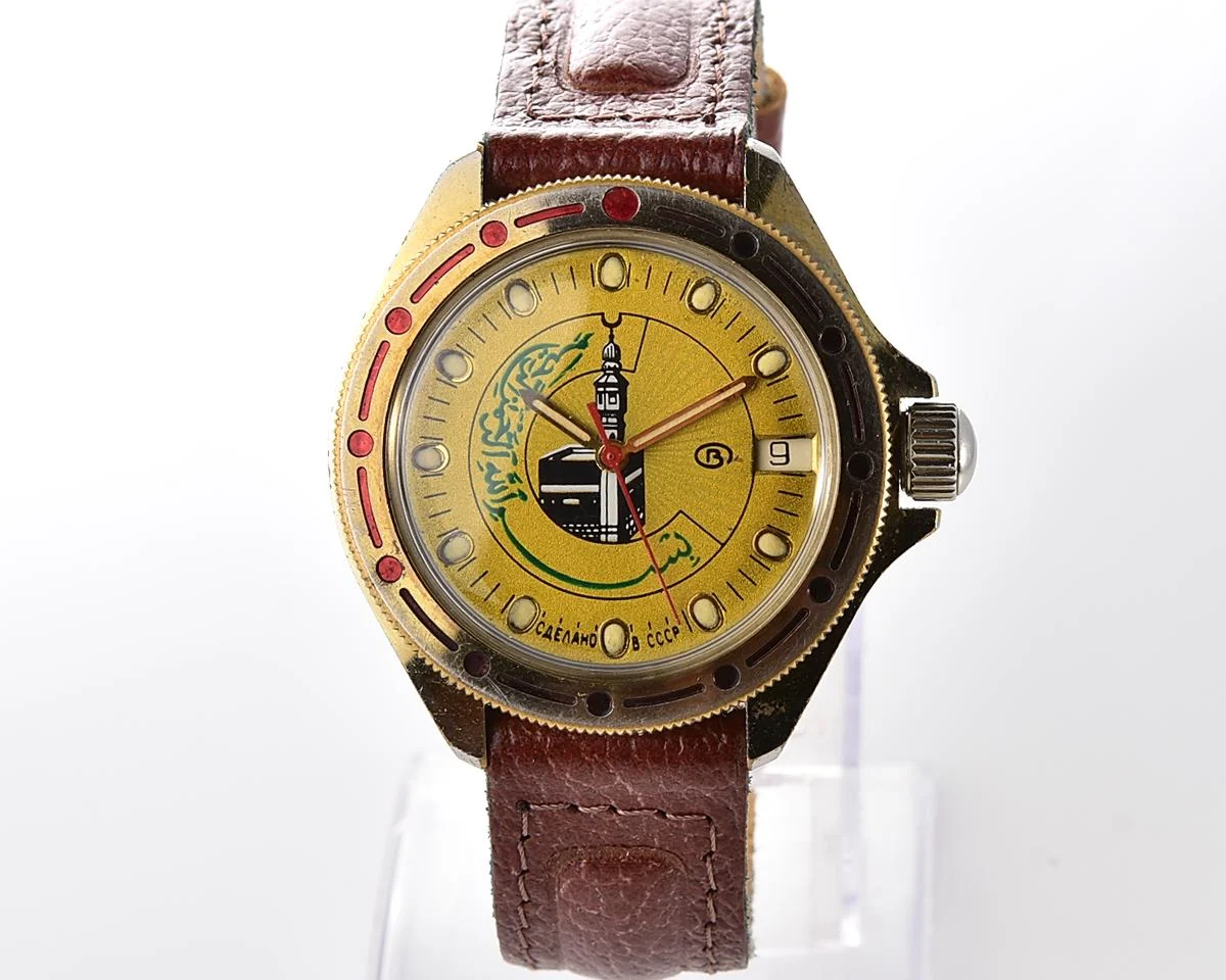 Soviet Komandirskie vintage mechanical wristwatch with Kaaba & minaret on it's gold-toned sunburst dial