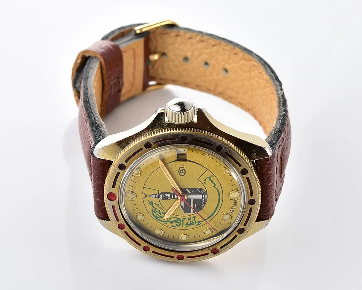 Soviet Komandirskie vintage mechanical wristwatch with Kaaba & minaret on it's gold-toned sunburst dial
