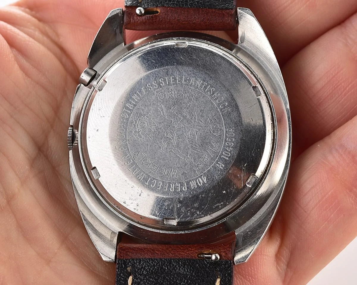 Vintage Orient Weekly Auto AAA Swimmer – Charcoal Sunburst Day-Date Automatic from the 1960s