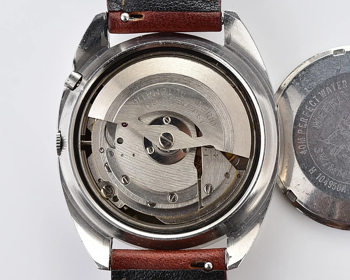 Vintage Orient Weekly Auto AAA Swimmer – Charcoal Sunburst Day-Date Automatic from the 1960s