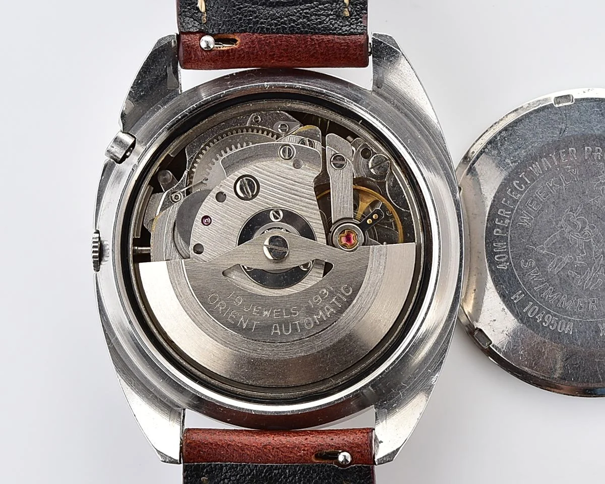 Vintage Orient Weekly Auto AAA Swimmer – Charcoal Sunburst Day-Date Automatic from the 1960s