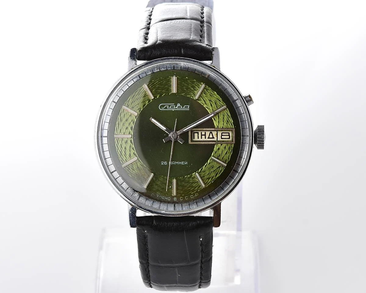 Slava soviet mechanical vintage watch with beautiful rare “vortex” dial!