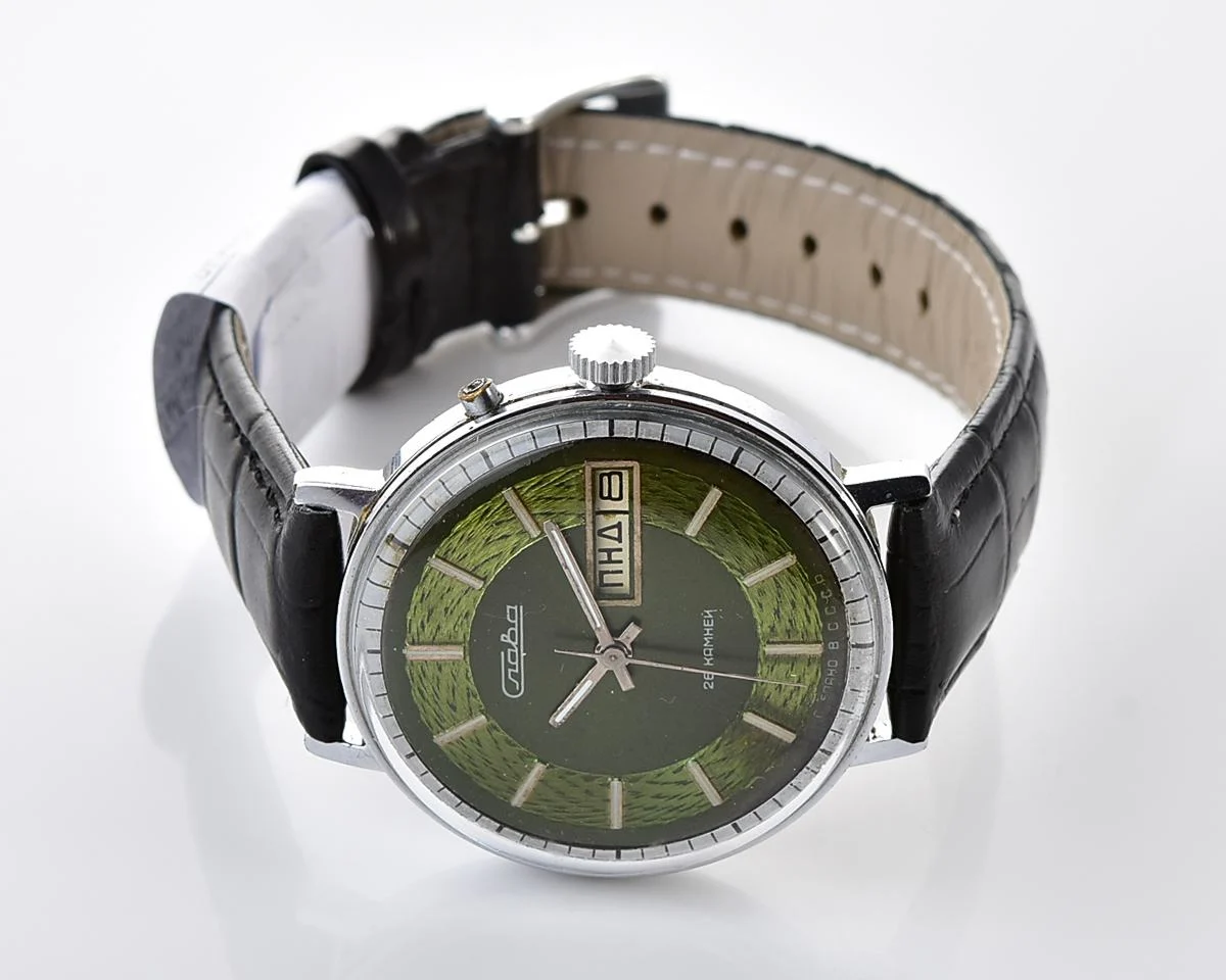 Slava soviet mechanical vintage watch with beautiful rare “vortex” dial!