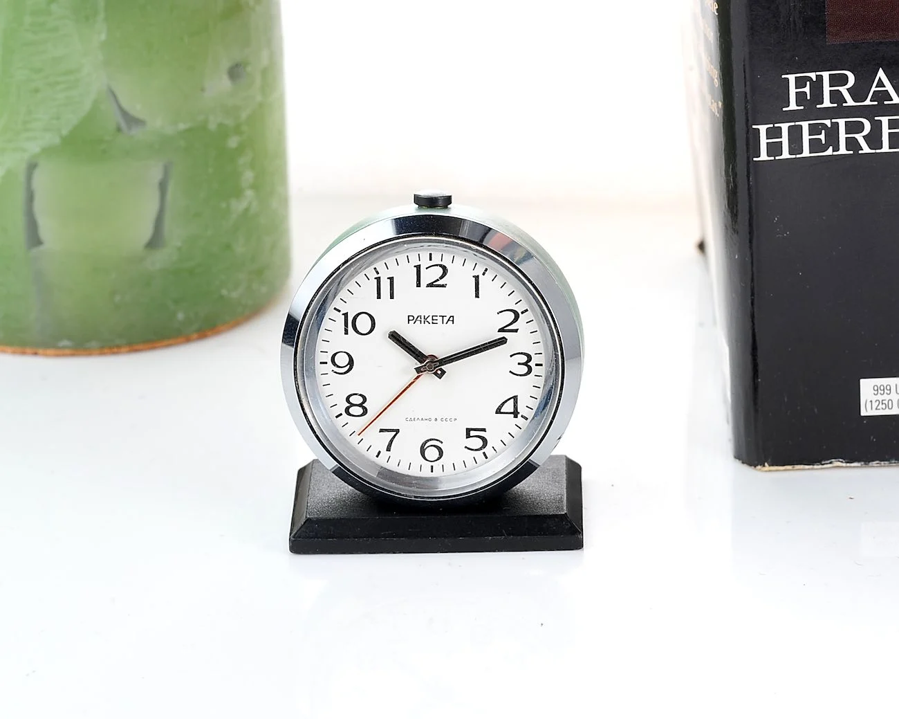 Small Raketa Soviet mechanical alarm clock - less than 2 inches in diameter
