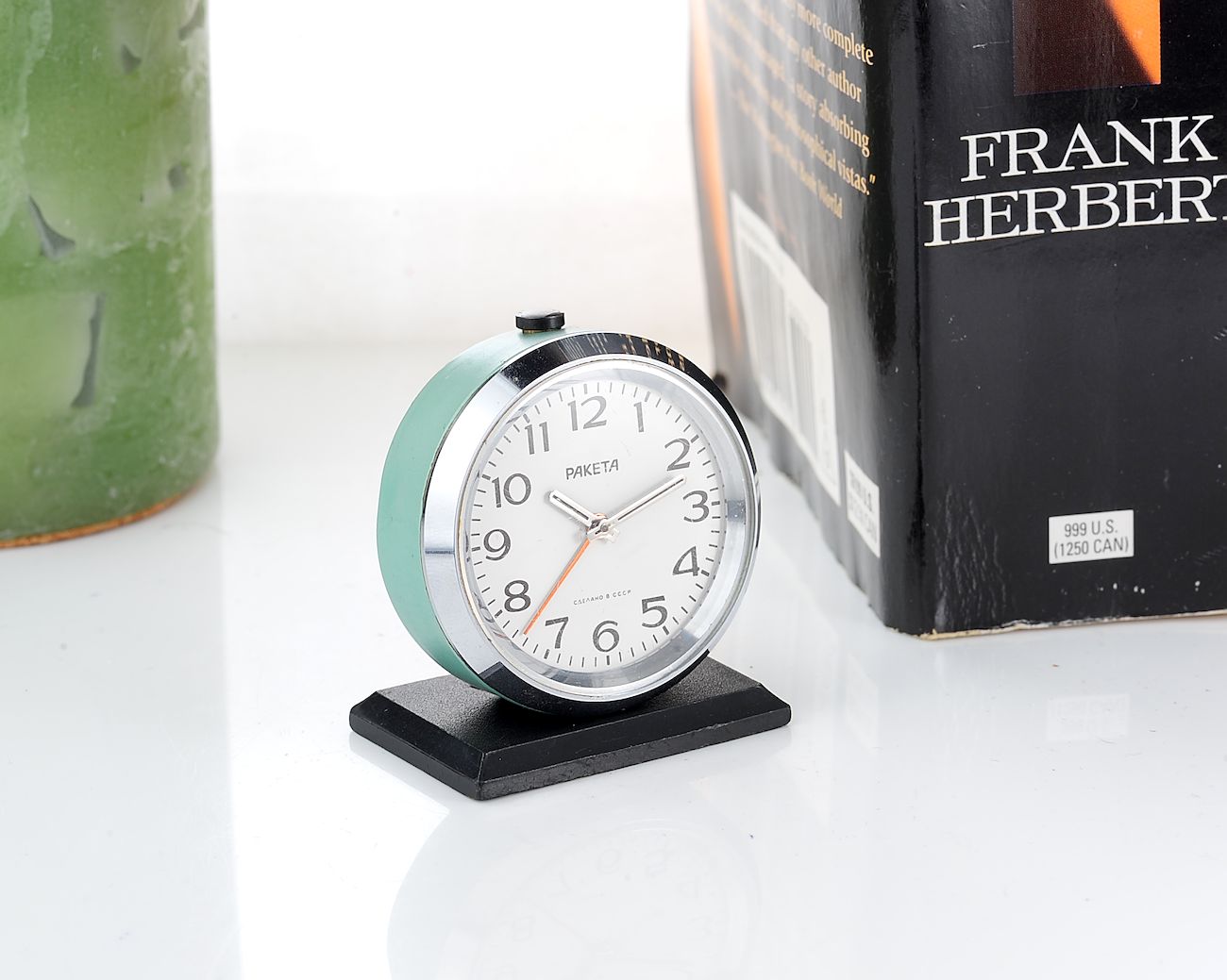 Small Raketa soviet mechanical alarm clock - less than 2 inches in diameter