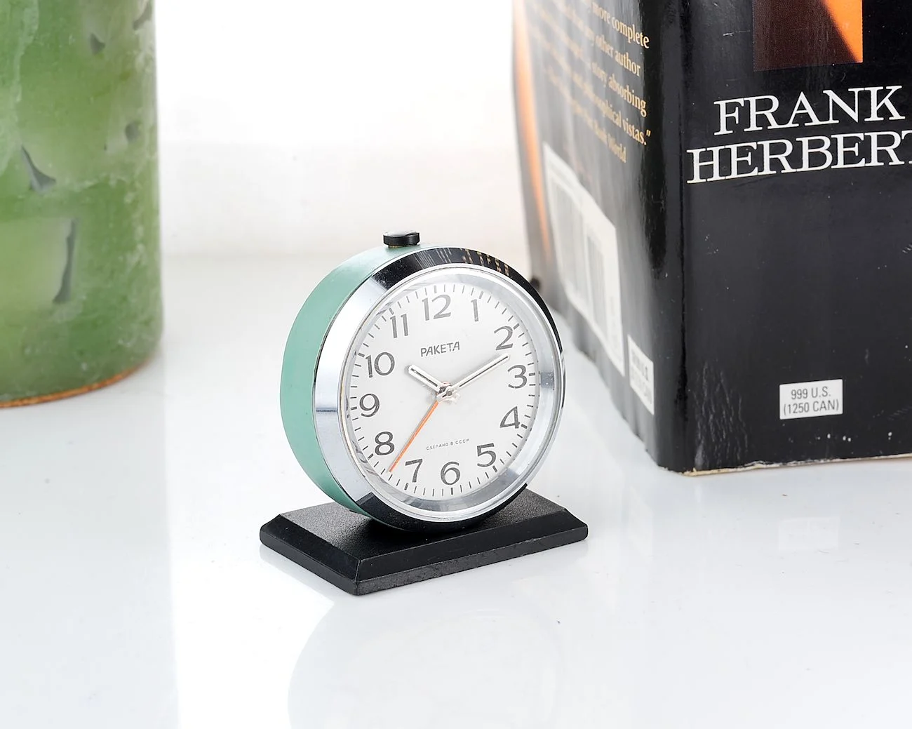 Small Raketa Soviet mechanical alarm clock - less than 2 inches in diameter