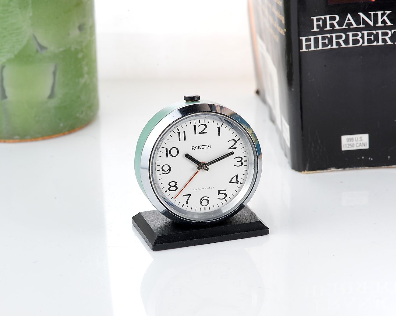 Small Raketa soviet mechanical alarm clock - less than 2 inches in diameter