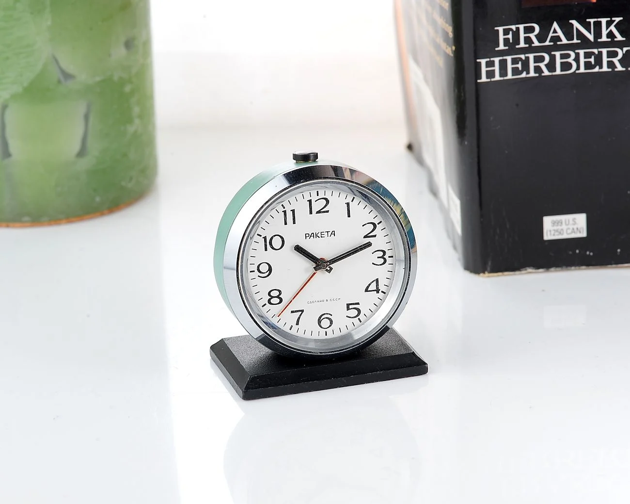 Small Raketa Soviet mechanical alarm clock - less than 2 inches in diameter