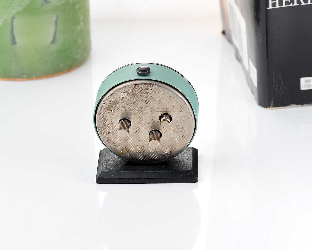 Small Raketa soviet mechanical alarm clock - less than 2 inches in diameter