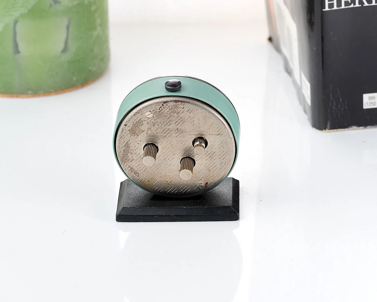 Small Raketa Soviet mechanical alarm clock - less than 2 inches in diameter