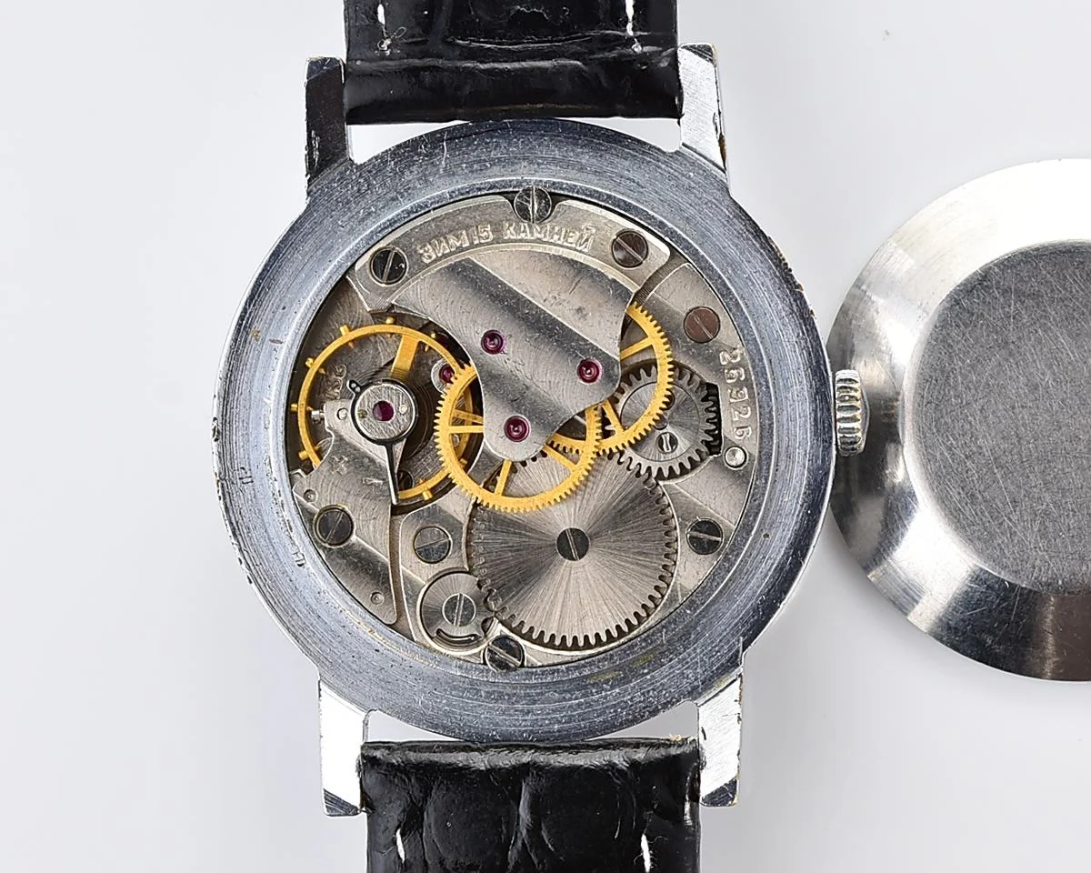 Vintage Soviet mechanical watch Pobeda, ZiM factory – black "linen" dial