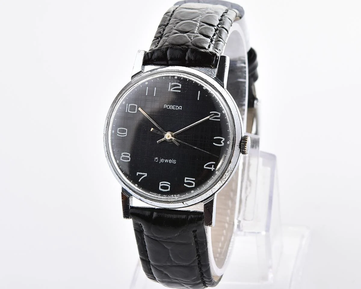Vintage Soviet mechanical watch Pobeda, ZiM factory – black "linen" dial