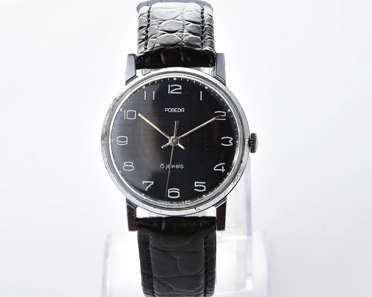 Vintage Soviet mechanical watch Pobeda, ZiM factory – black "linen" dial