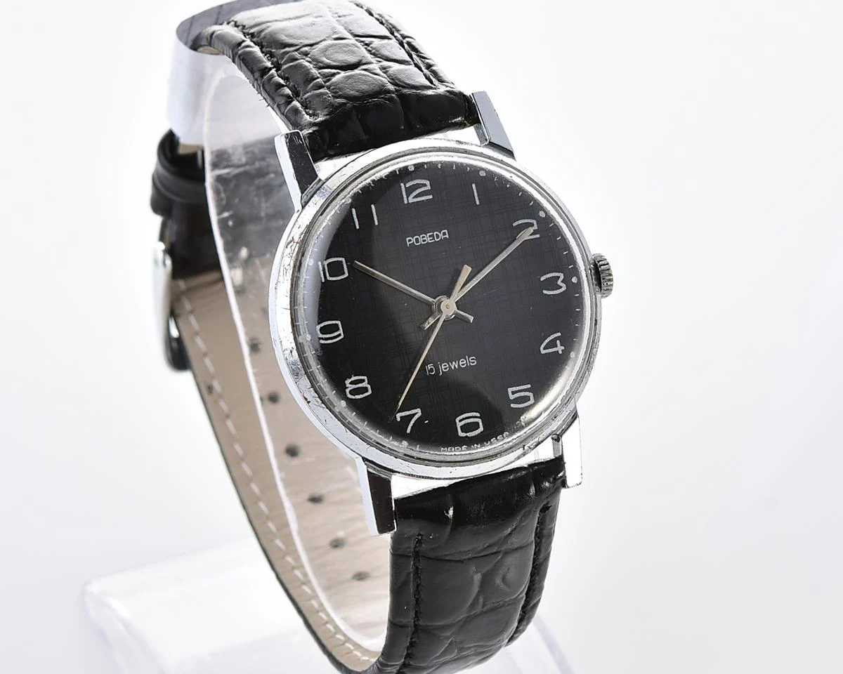 Vintage Soviet mechanical watch Pobeda, ZiM factory – black "linen" dial