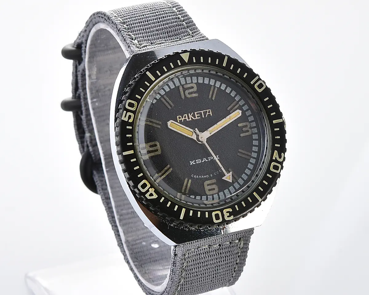 Vintage Soviet Raketa quartz wristwatch with rotating bezel