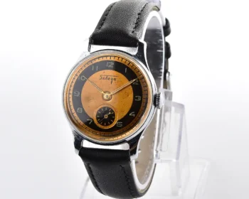 Vintage Soviet Pobeda mechanical watch, ZiM factory – uncommon two-tone black and copper bullseye dial, from the 4th quarter of 1957