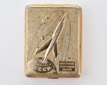 Vintage Space Rocket Sputnik metal cigarette box – "Soviet Earth Satellites", gold-tone Soviet cosmos exploration era relic