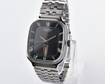 Square Slava "Fridge" Soviet mechanical watch with black dial, Roman numerals, day & date, 26 jewels, from the 1980s
